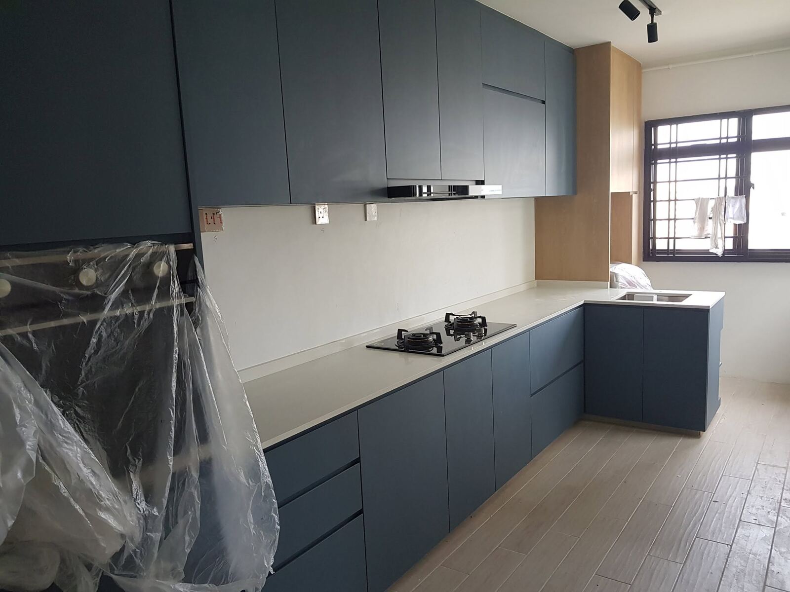 New kitchen cabinets still wrapped during the build