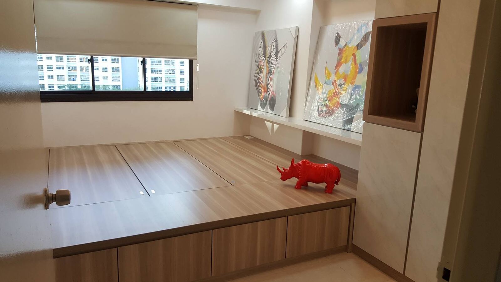 Raised oak platform room with built-in storage